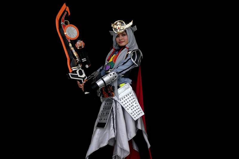 A young Indonesian Muslim cosplayer was dressed as the Kamen rider Gaim in a hijab cosplay event