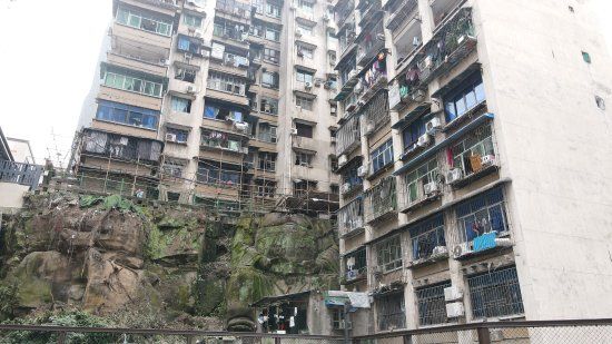 Photos of the Buddha statue that inspired indie game Sanfu