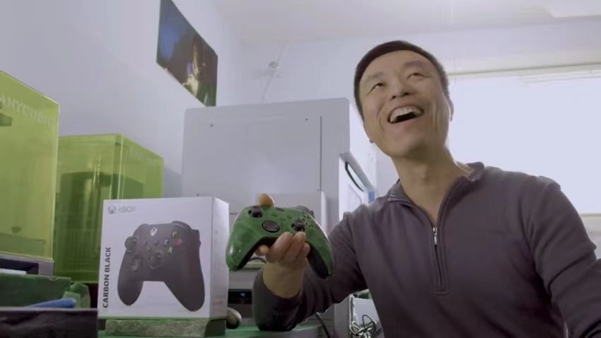 Andy Chi holding the jade controller